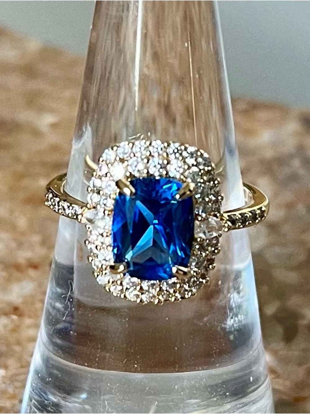 Bomb Party RBP6643 Aqua Blue Spinel on Gold Halo Ring with Deep Cushion Stone